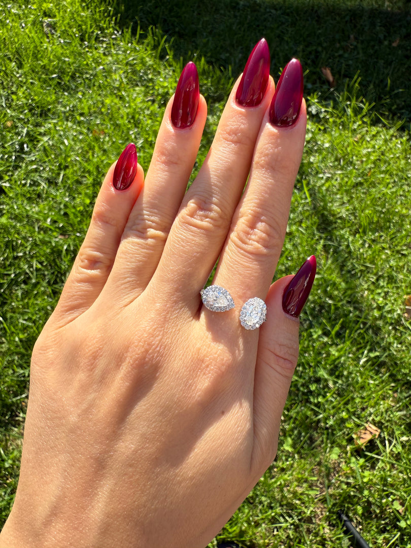Two stone Oval Pear diamond ring